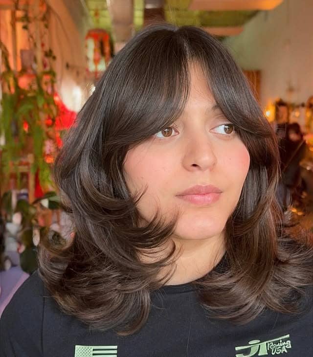 10. Deep Brunette Shaggy Layered Bob with Curtain Fringe - Short Layered Haircuts