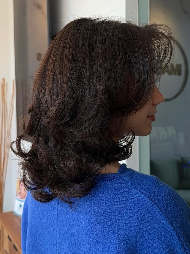 16. Rich Brunette Voluminous Butterfly Bob - Short Layered Haircuts