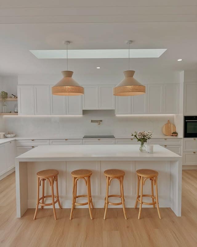 1. Warm White Kitchen with Natural Wood Accents - all white kitchen ideas
