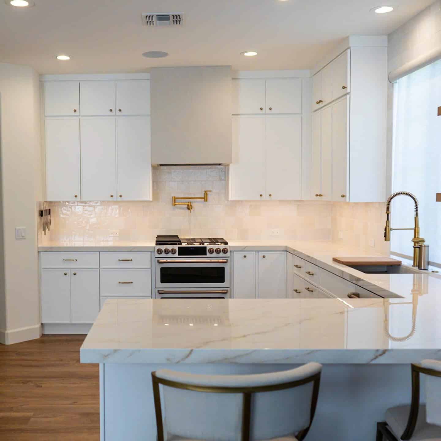 2. Classic White Kitchen with Gold Hardware - all white kitchen ideas
