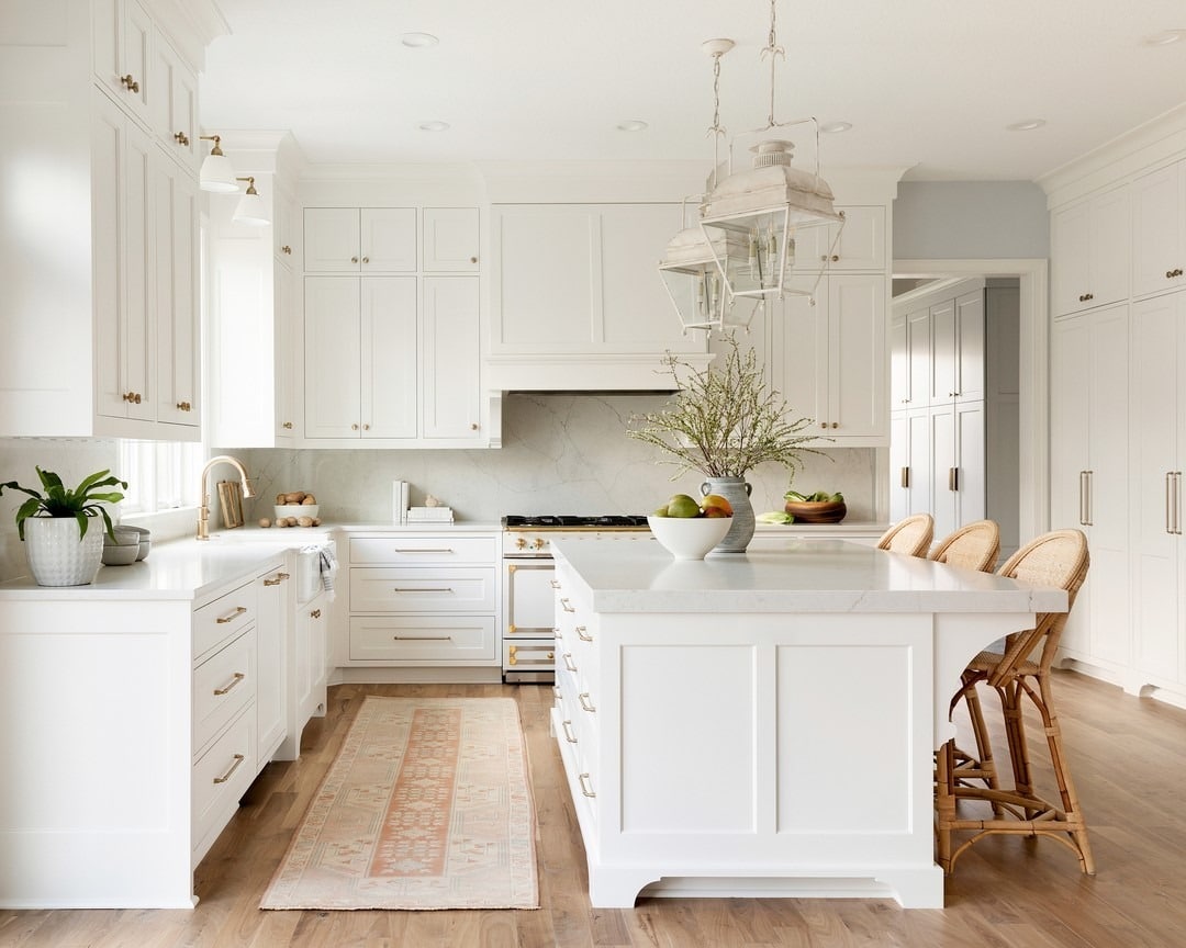9. Timeless White Kitchen with Soft Gold Details - all white kitchen ideas
