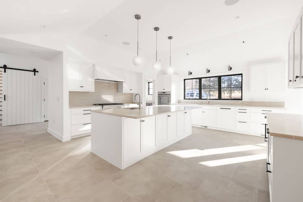 10. Bright White Kitchen with Black Window Frames - all white kitchen ideas