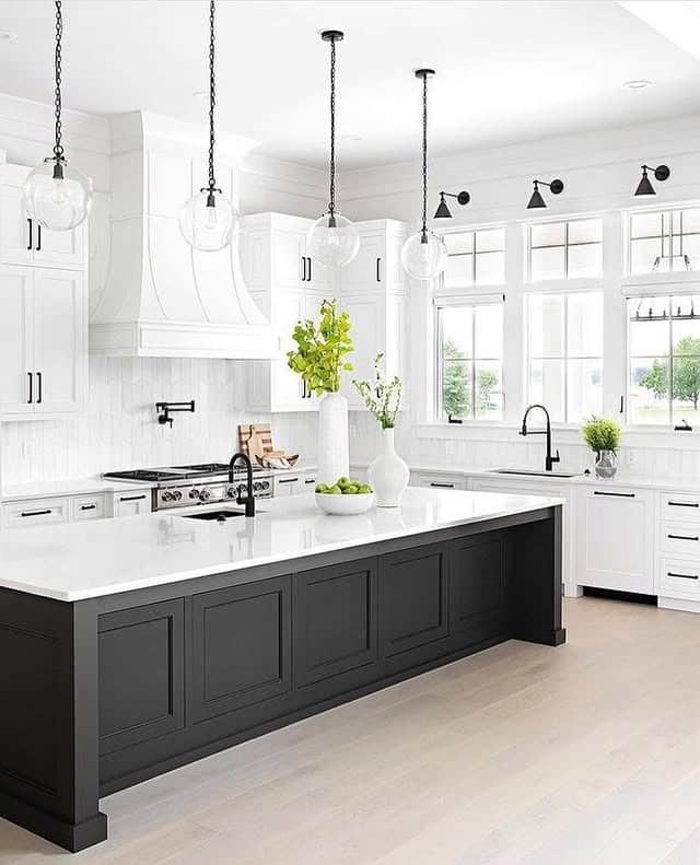 11. Elegant White Kitchen with Charcoal Black Island - all white kitchen ideas