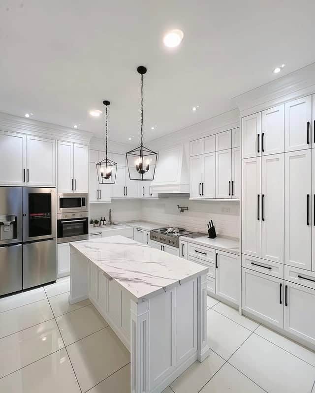 18. Modern White Kitchen with Black Lantern Lighting - all white kitchen ideas