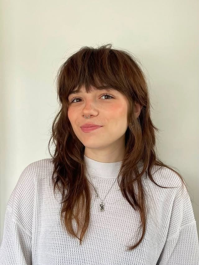 12. Warm Auburn Shag with Choppy Bangs - Shaggy Haircut