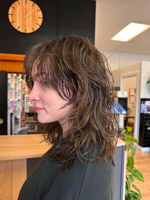 18. Ash Brown Wavy Shag with Piecey Bangs - Shaggy Haircut