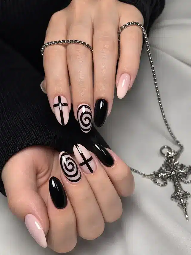 10. Black and Nude Almond Nails with Cross and Spiral Art - cross nail ideas