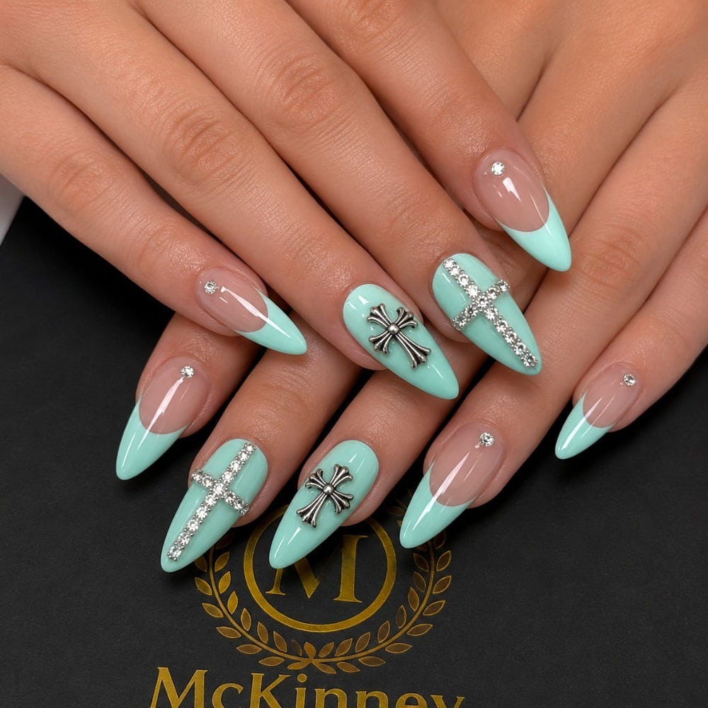 12. Mint Green Cross Almond Nails with Silver Rhinestones - cross nail ideas