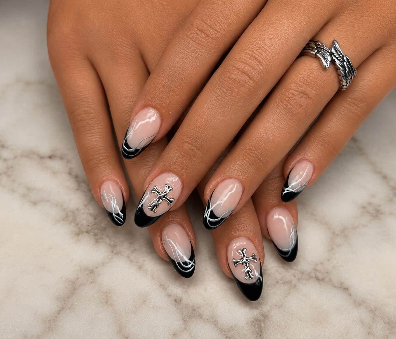 16. Black French Tip Almond Nails with Silver Cross Charms - cross nail ideas