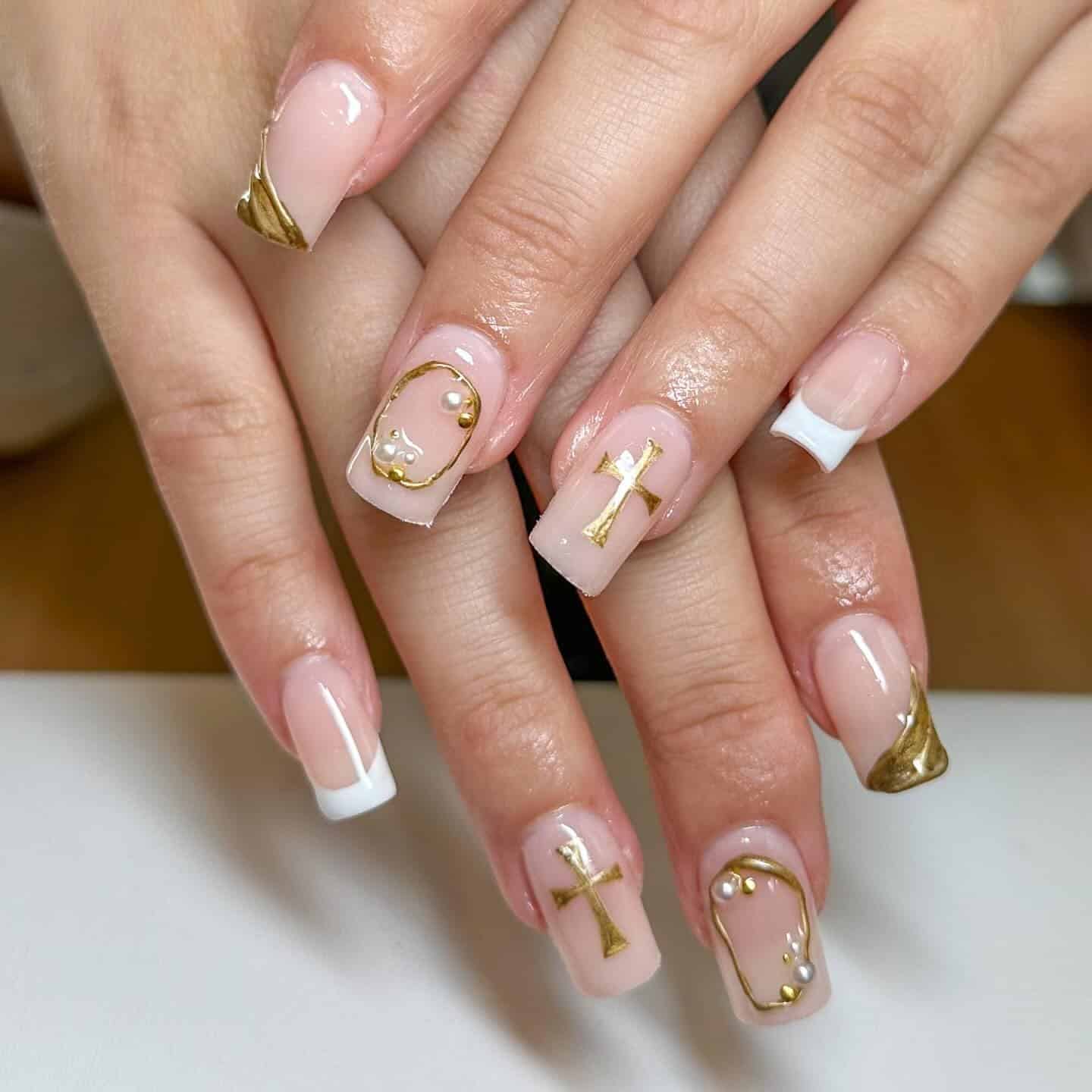 19. Nude and Gold Cross Square Nails with Pearl Accents - cross nail ideas