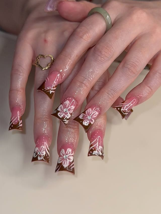 2. Dusty Pink and Brown Floral Duck Nails - duck nail ideas
