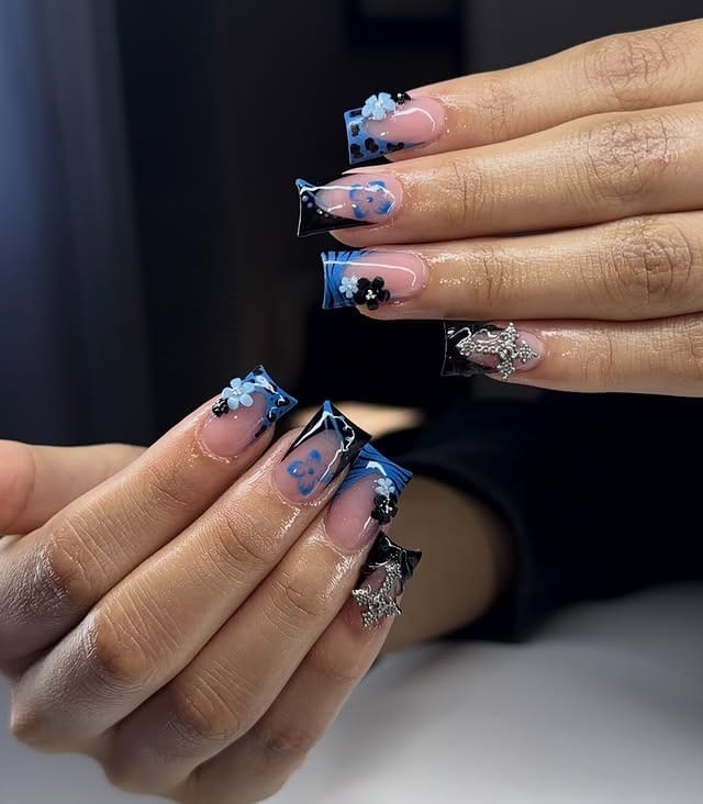 10. Blue and Black Floral Duck Nails with Silver Star Charms - duck nail ideas