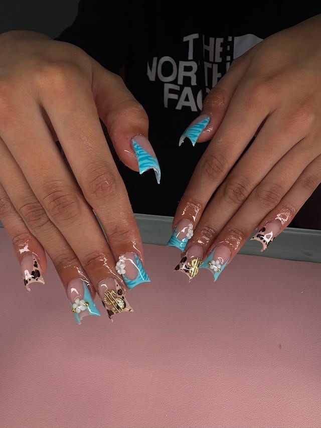 18. Turquoise Blue and Nude Floral Duck Nails - duck nail ideas