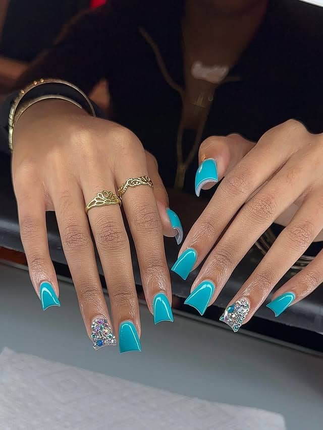 21. Turquoise Blue Duck Nails with Rhinestone Accents - duck nail ideas