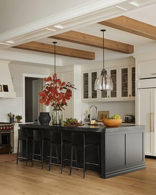 6. Transitional Black and White Kitchen with Exposed Oak Beams - black kitchen decor ideas
