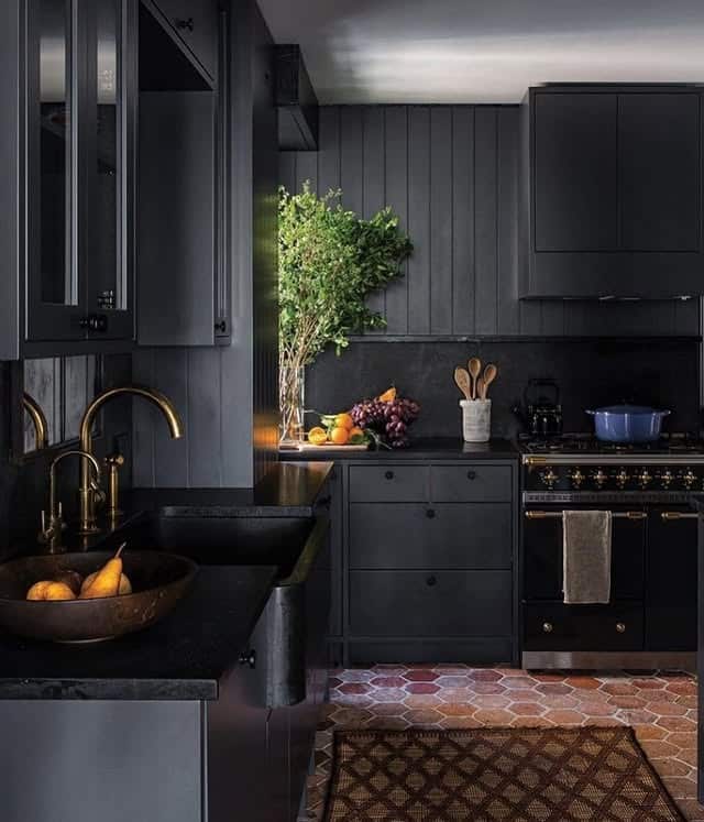 19. Moody Charcoal Black Kitchen with Terracotta Hexagon Flooring - black kitchen decor ideas