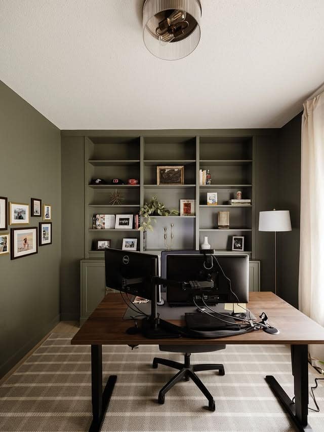 2. Moody Sage Green Office with Floor-to-Ceiling Shelving - sage green office ideas