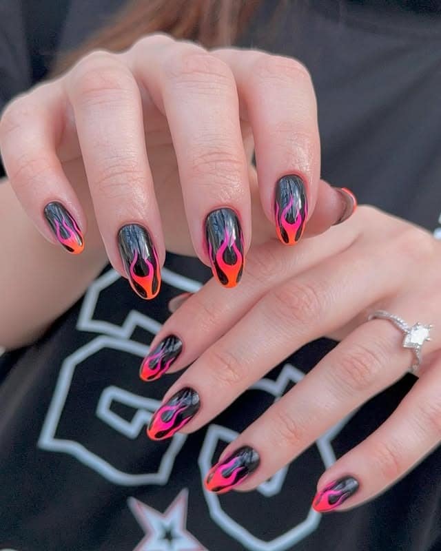 7. Black and Neon Pink Flame Almond Nails - flame nail ideas