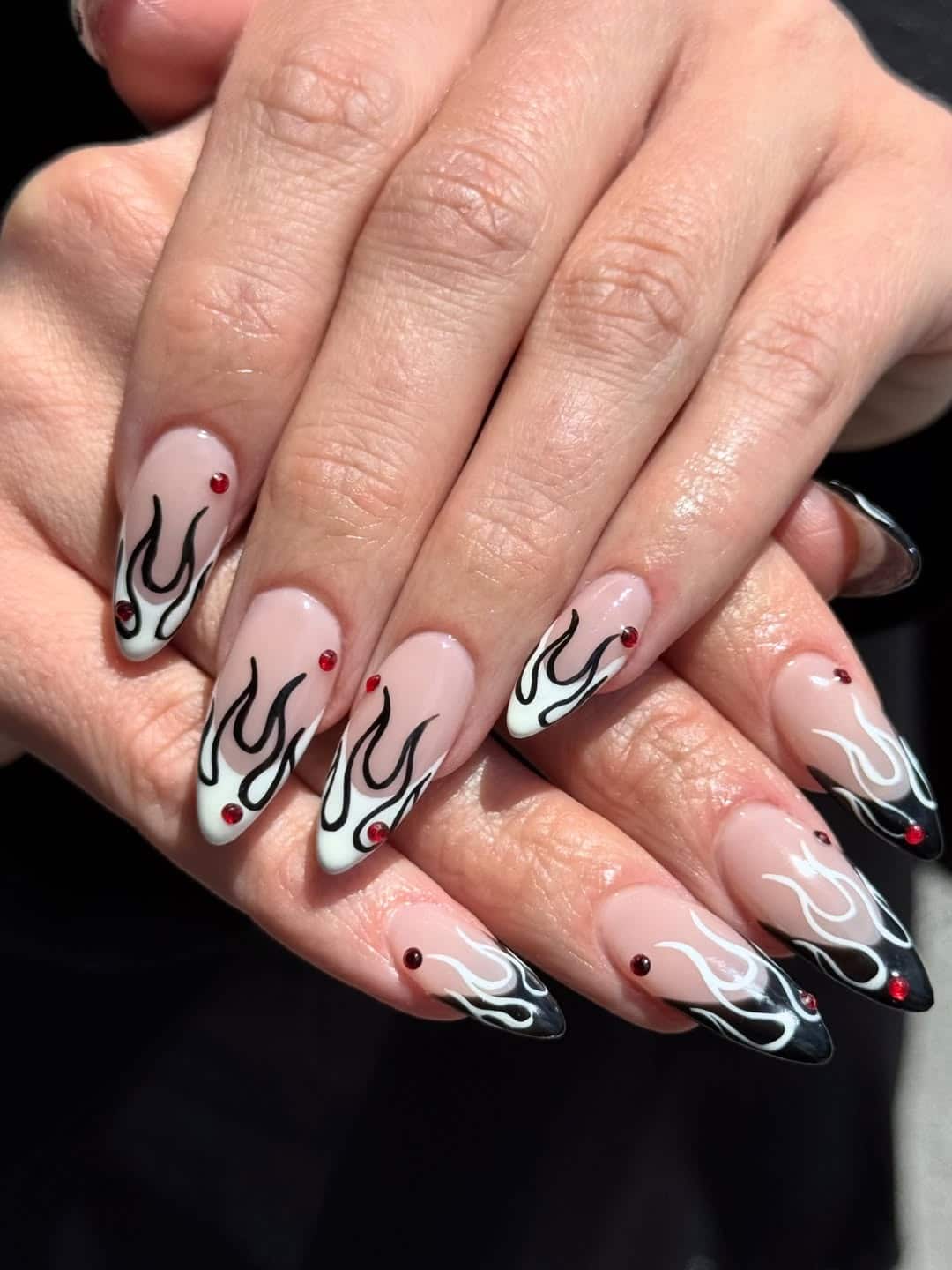12. Black and White Flame Almond Nails with Red Rhinestones - flame nail ideas
