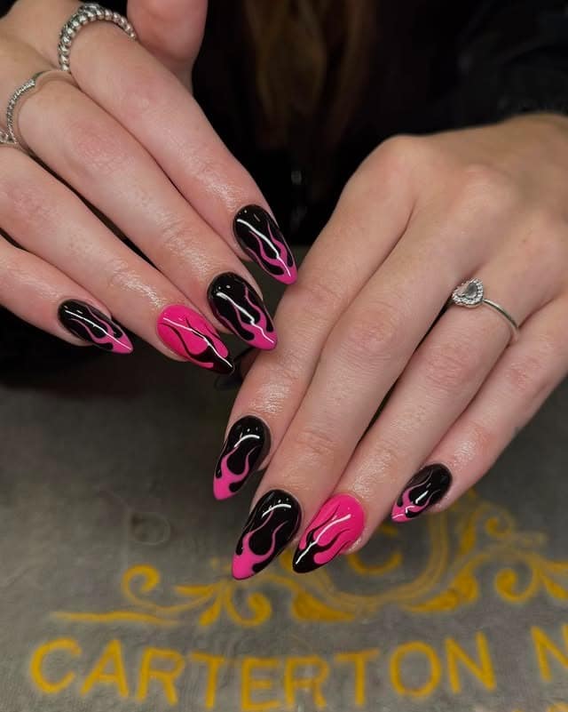 16. Black and Bright Pink Flame Almond Nails - flame nail ideas