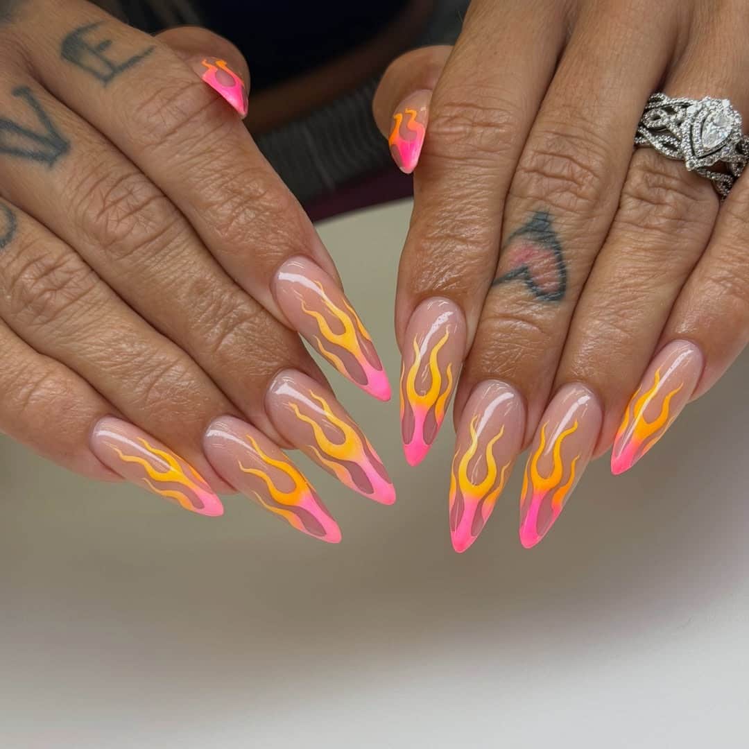 19. Neon Orange and Pink Flame Stiletto Nails - flame nail ideas
