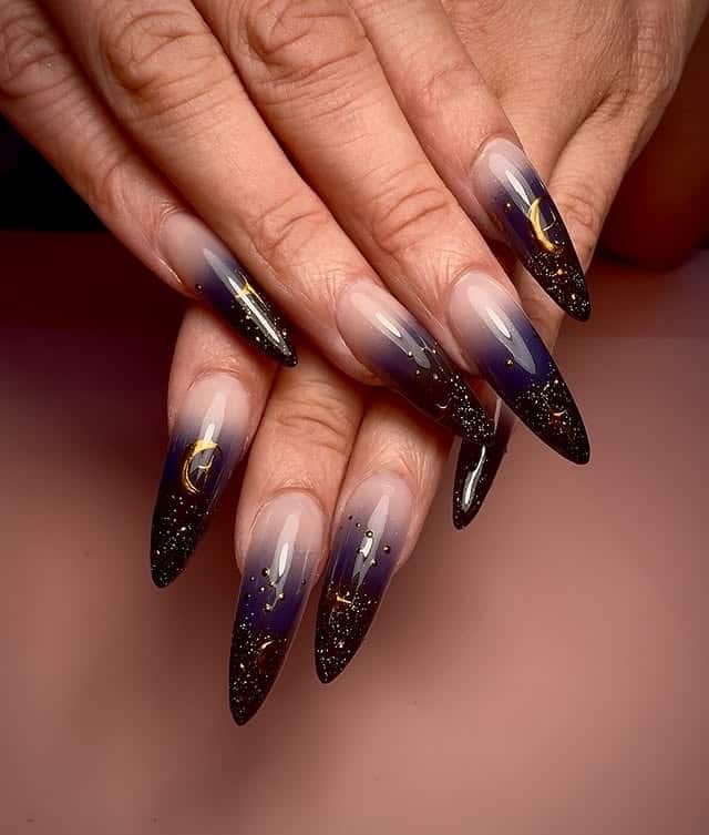 3. Black and Purple Ombre Galaxy Stiletto Nails - galaxy nail ideas