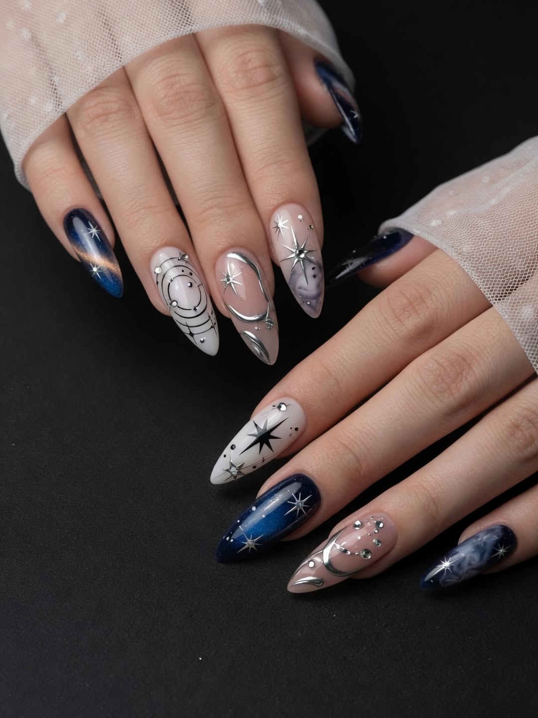 12. Navy Blue and Silver Celestial Galaxy Stiletto Nails - galaxy nail ideas