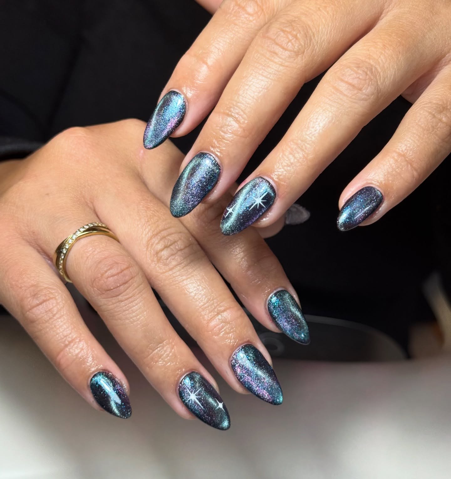 18. Teal and Purple Magnetic Galaxy Almond Nails - galaxy nail ideas