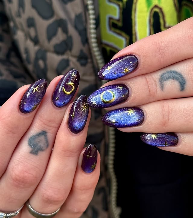 20. Violet Purple and Gold Celestial Galaxy Almond Nails - galaxy nail ideas