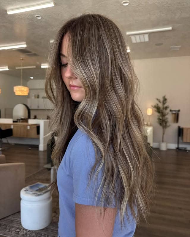 7. Mushroom Brown Highlights on Long Tousled Layers - Hair Color with Highlights