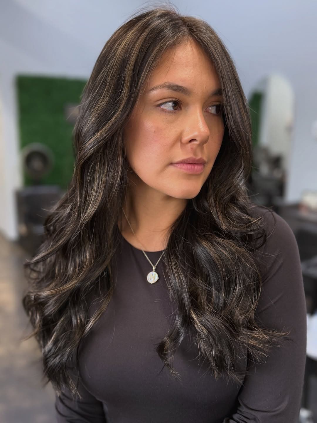19. Subtle Caramel Highlights on Long Dark Brunette Waves - Hair Color with Highlights