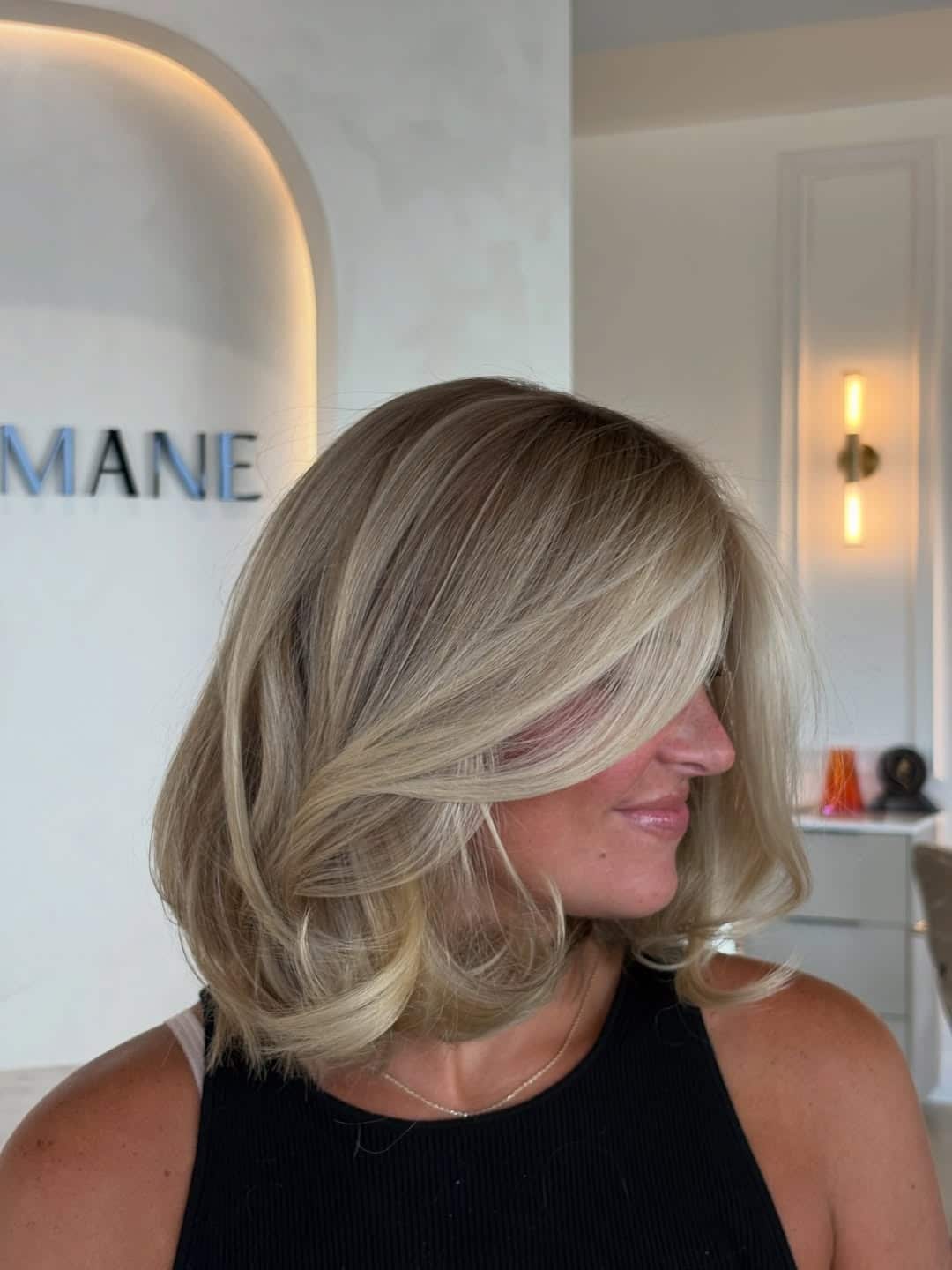 3. Creamy Blonde Shoulder-Length Bob with Voluminous Layers - Chic-Length Hairstyles