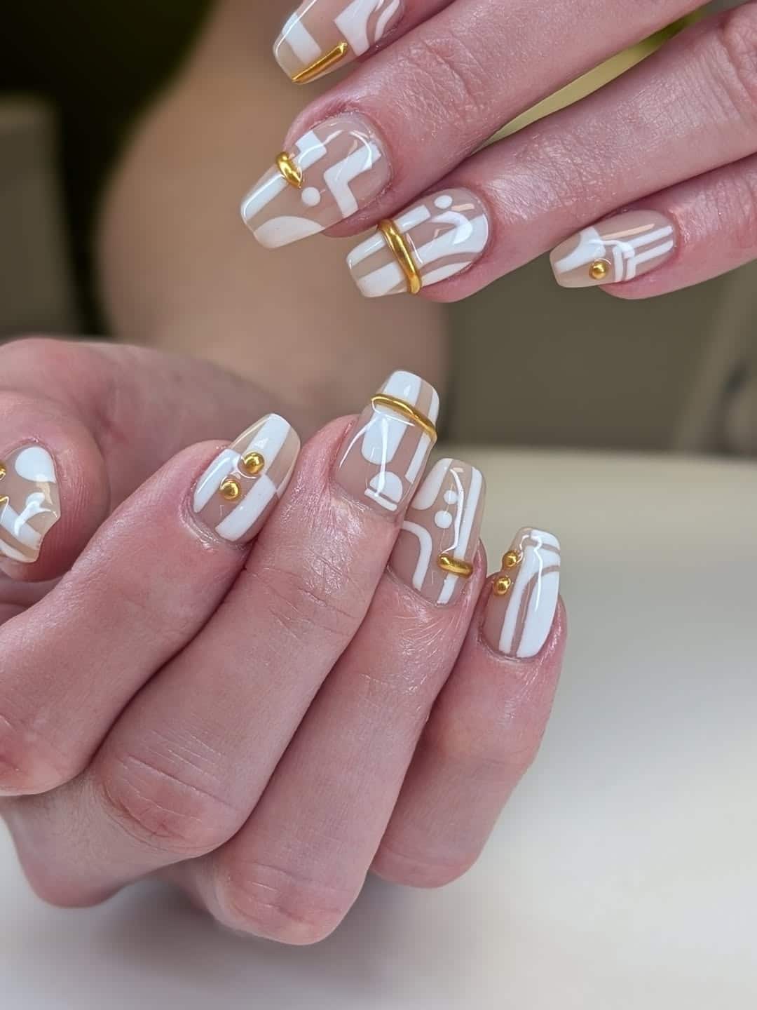 7. White and Gold Abstract Geometric Square Nails - geometric nail ideas