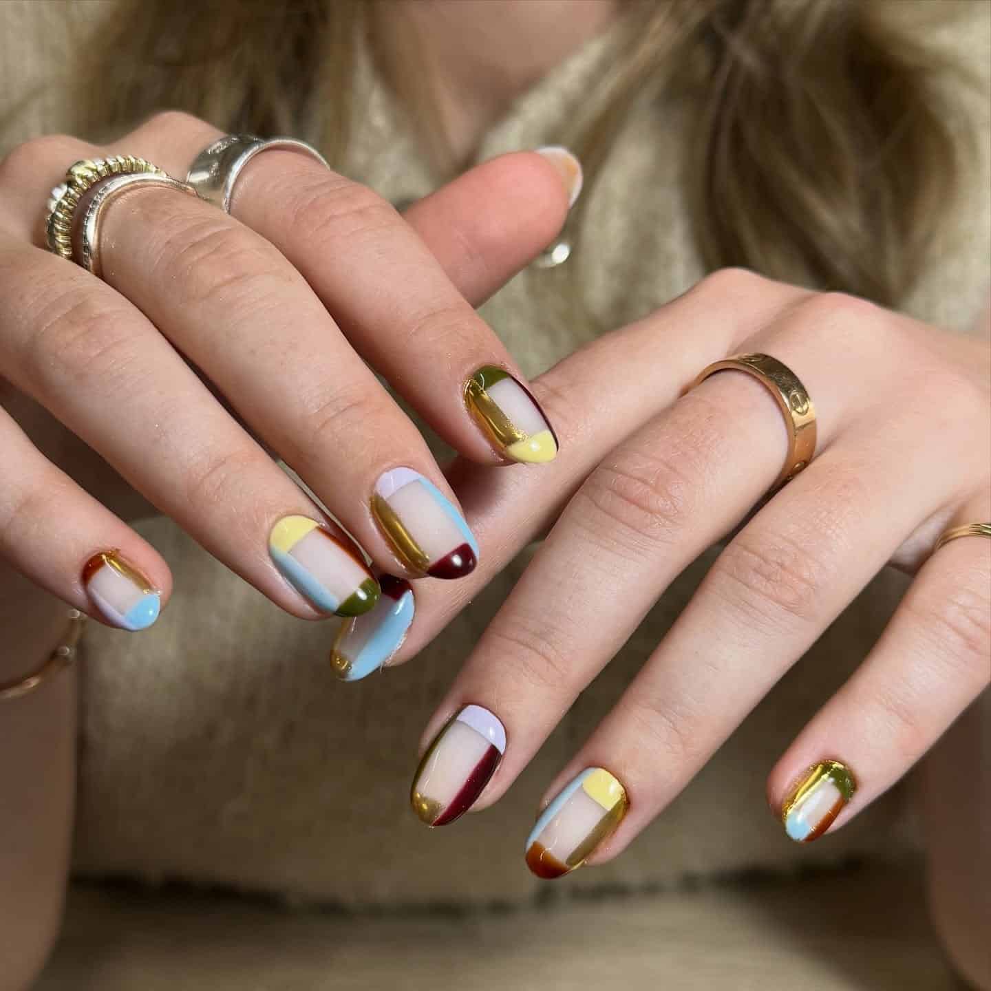 9. Pastel Blue and Gold Geometric Color Block Nails - geometric nail ideas
