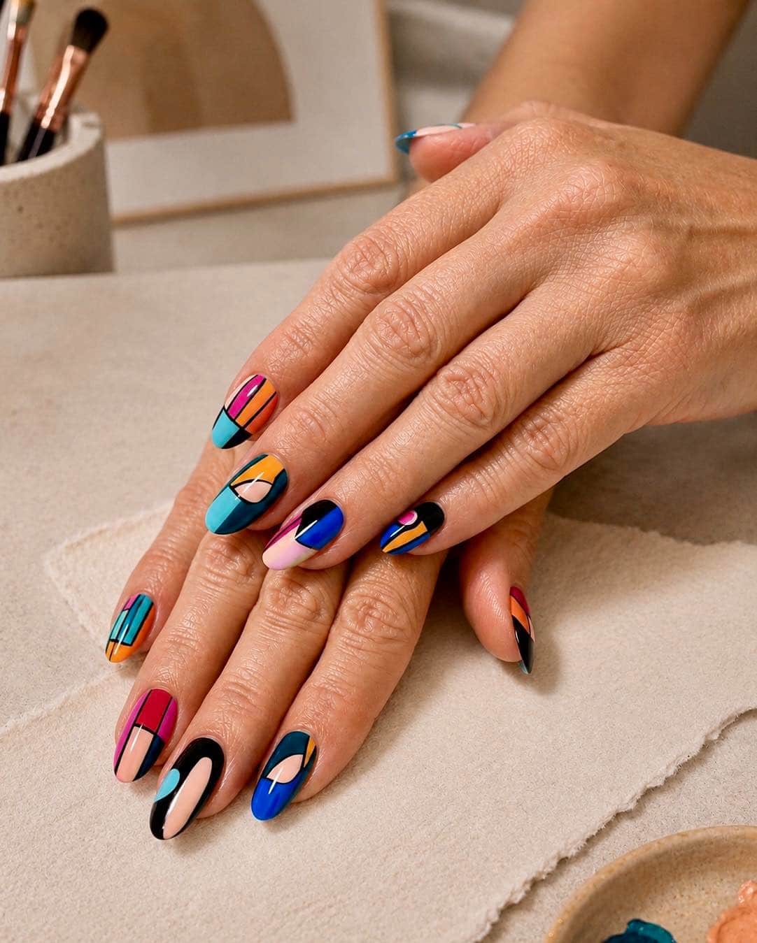 11. Bright Multicolor Abstract Geometric Almond Nails - geometric nail ideas