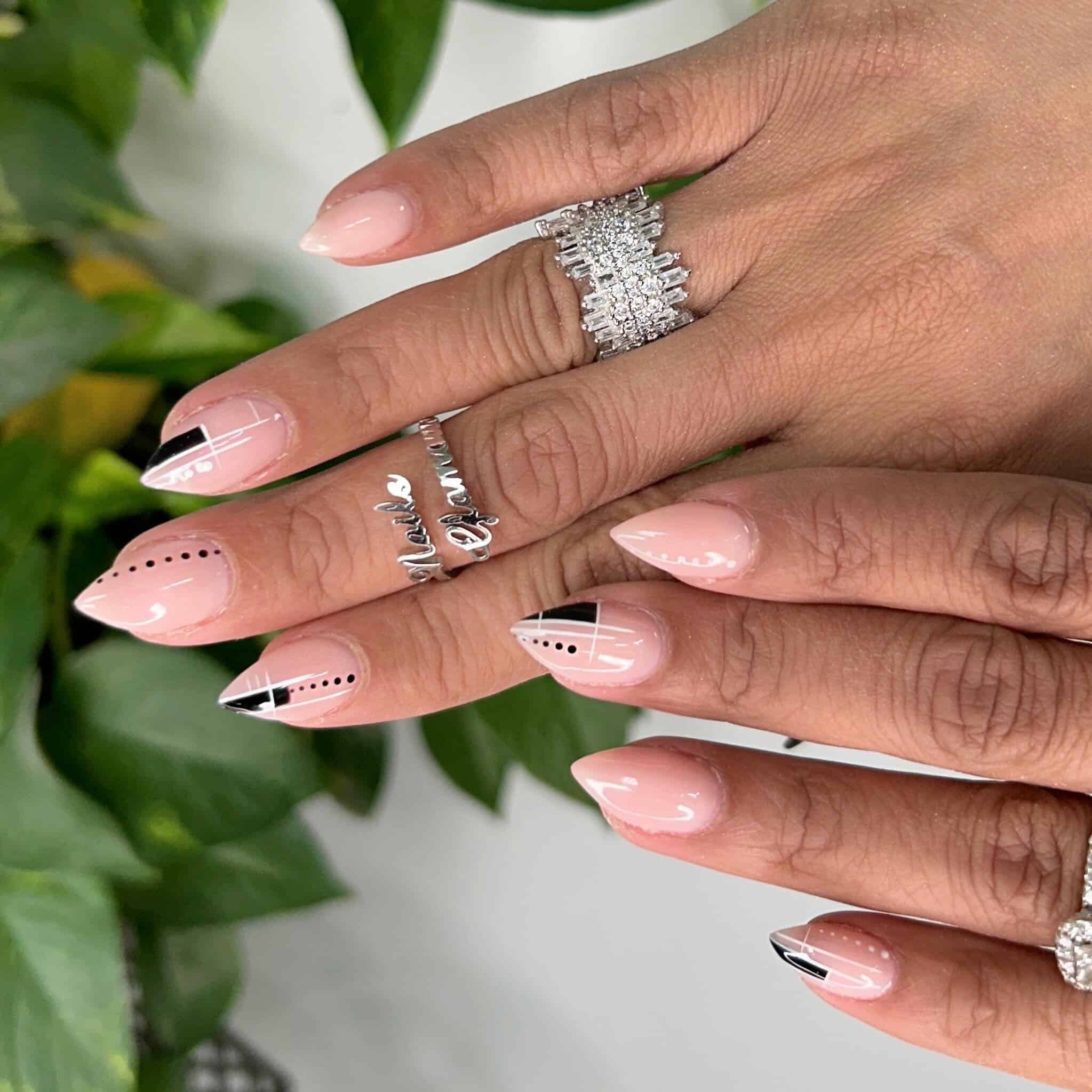 19. Nude Pink and Black Geometric Stiletto Nails - geometric nail ideas