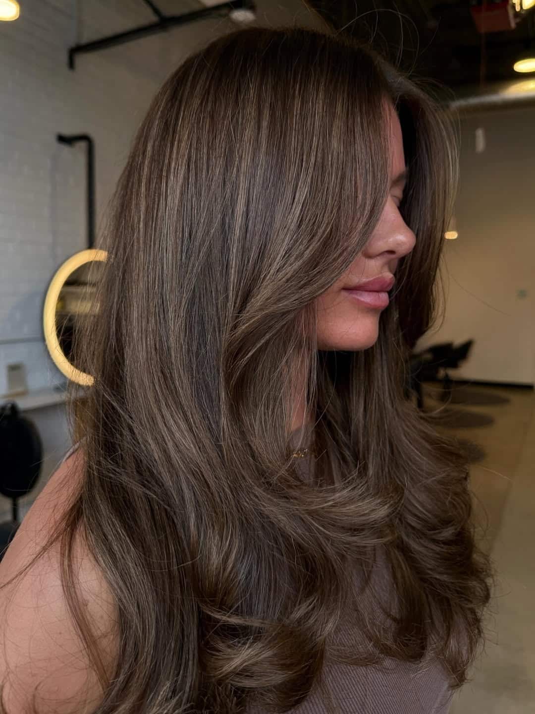 16. Mushroom Brunette Balayage with Bouncy Face-Framing Layers - Brunette Balayage Hair Color