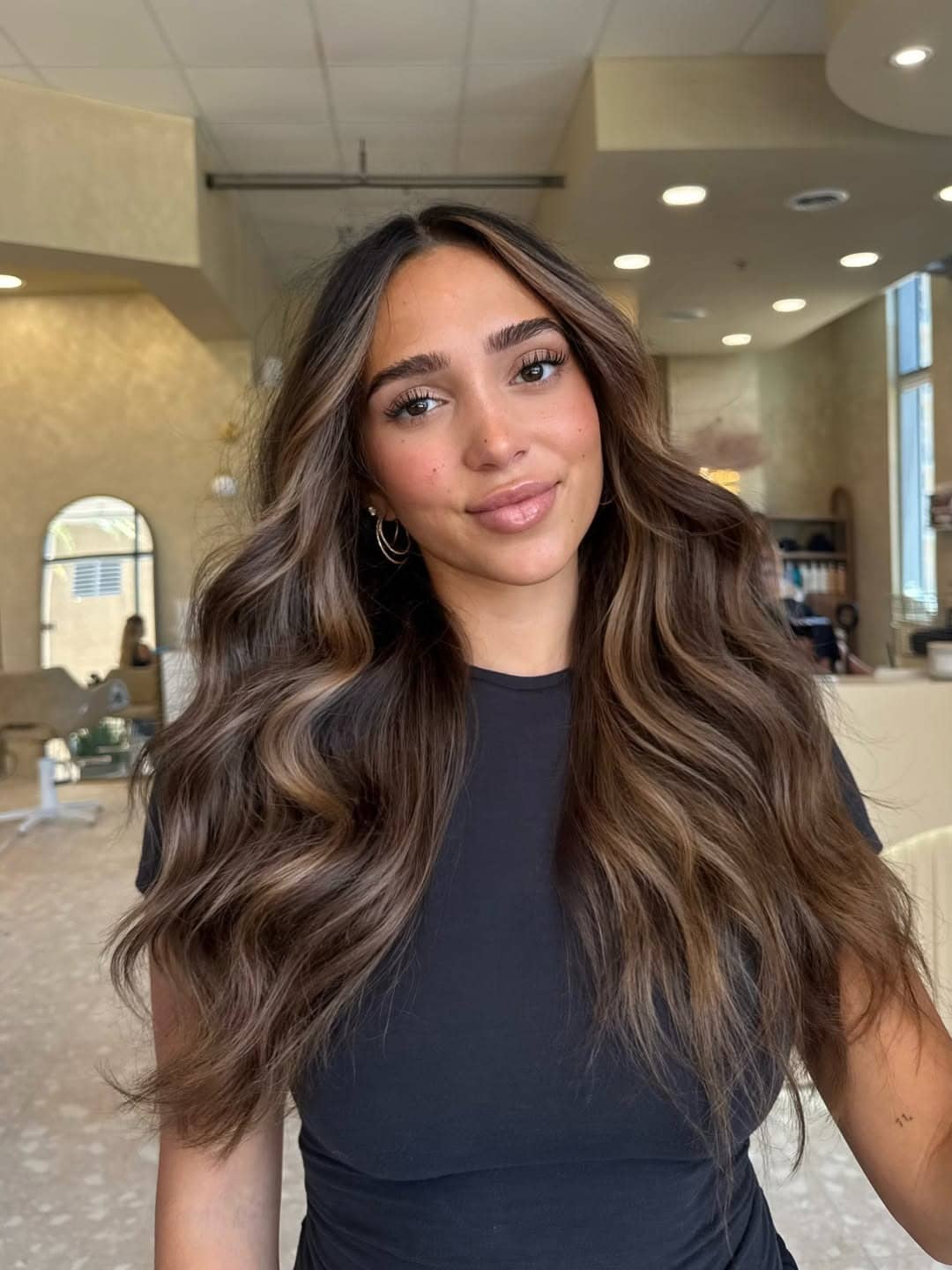 21. Smoky Mocha Brunette Balayage with Voluminous Waves - Brunette Balayage Hair Color