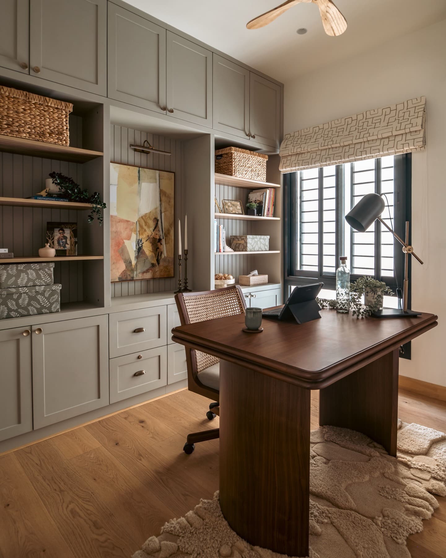 16. Modern Taupe and Walnut Home Office with Smart Built-In Storage - modern home office ideas