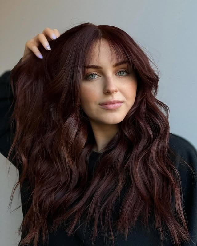 12. Deep Burgundy Auburn Hair with Long Textured Waves - Dark Auburn Hair Color