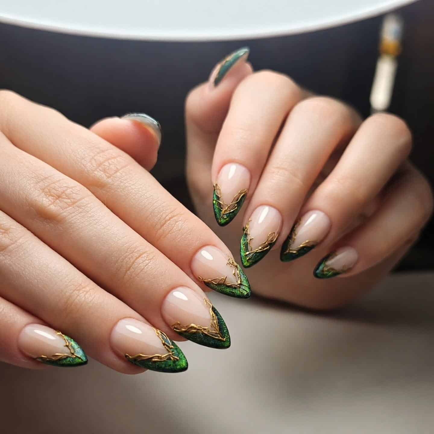 2. Emerald Green French Tip Nails with Gold Vine Accents - green and gold nail ideas
