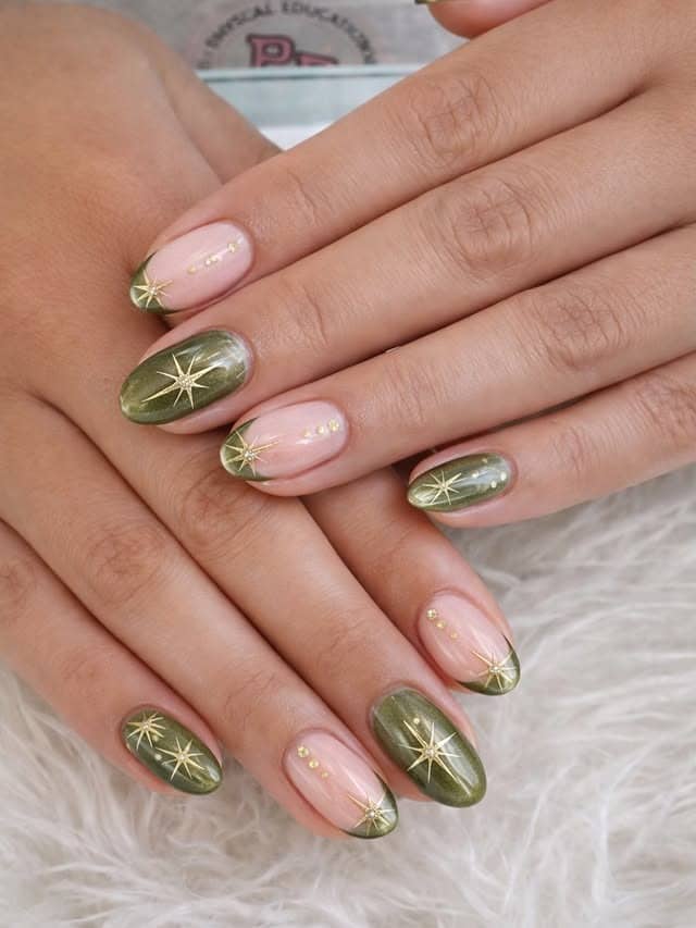 4. Olive Green Cat Eye Nails with Gold Starbursts - green and gold nail ideas