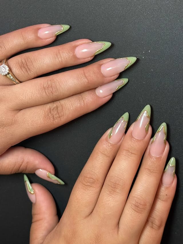 11. Sage Green French Tip Nails with Gold Wave Accents - green and gold nail ideas
