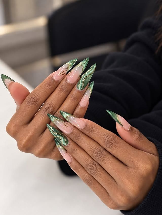 12. Emerald Green Stiletto Nails with Gold Swirl Details - green and gold nail ideas