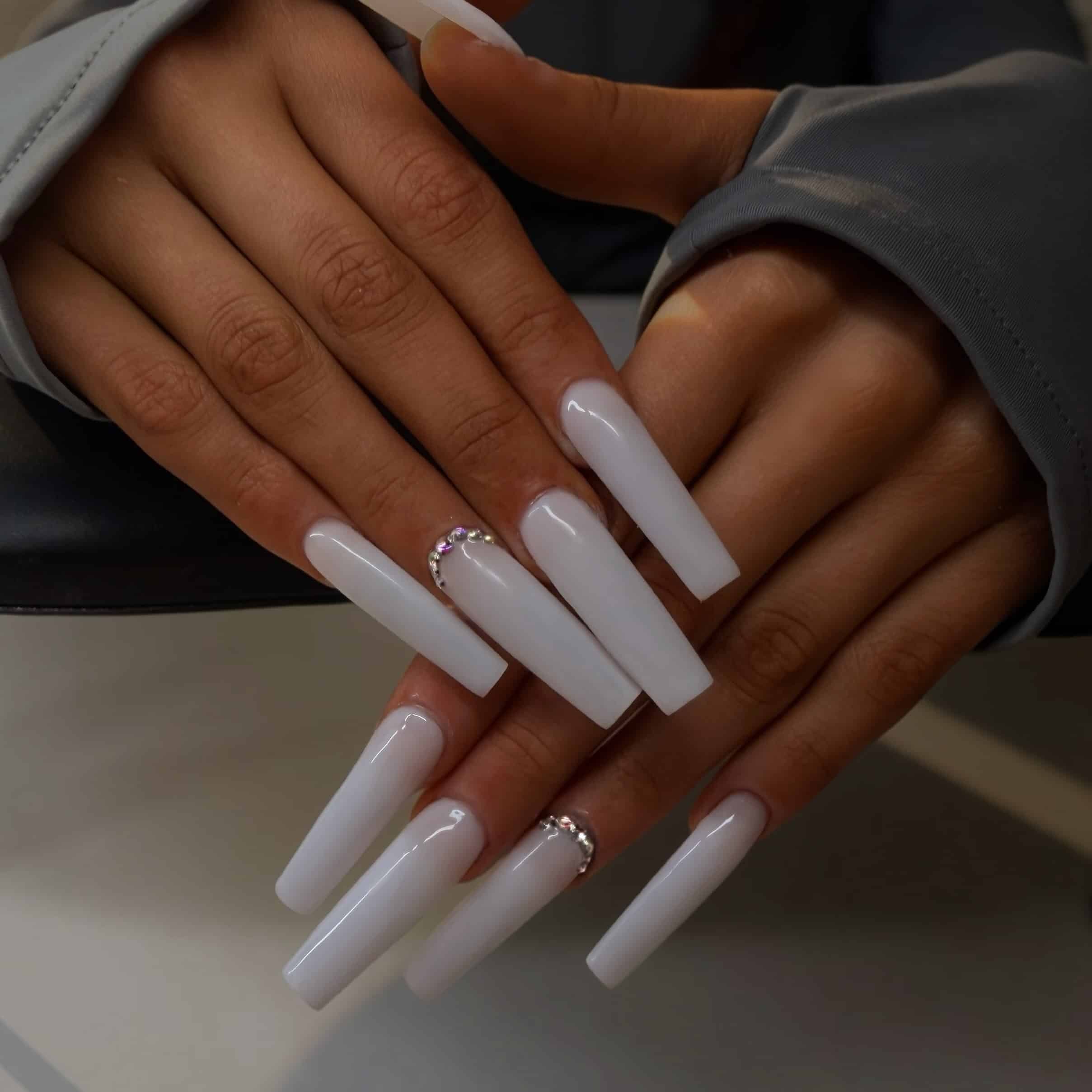 8. Milky White Long Square Nails with Rhinestone Accents - long square nail ideas