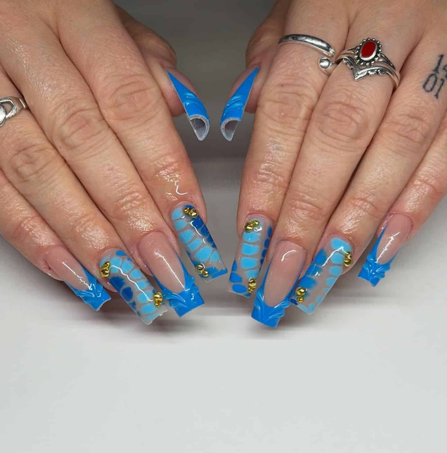 18. Ocean Blue 3D Long Square Nails with Gold Accents - long square nail ideas