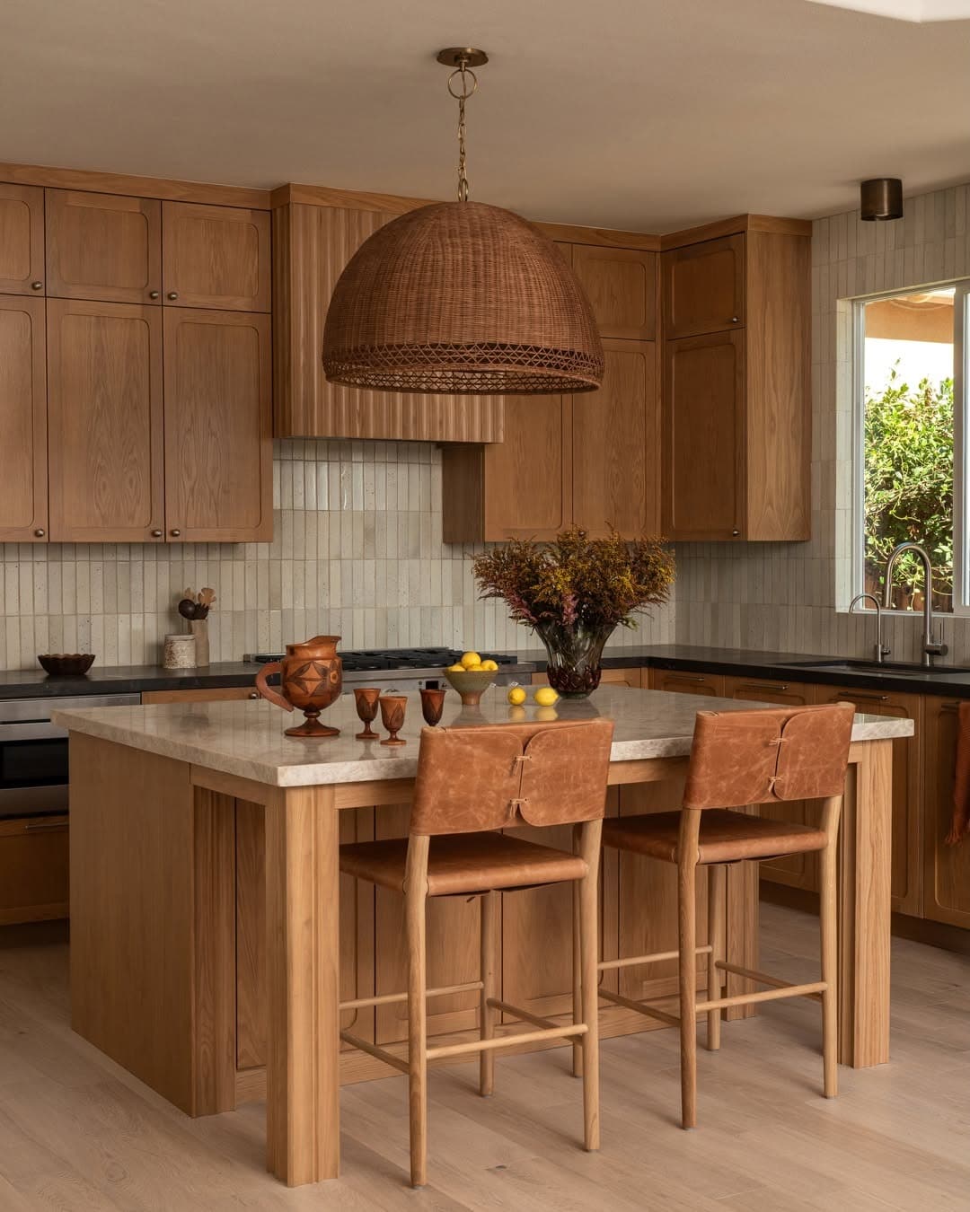 2. Natural Light Oak Kitchen with Brown Leather Accents - natural kitchen ideas