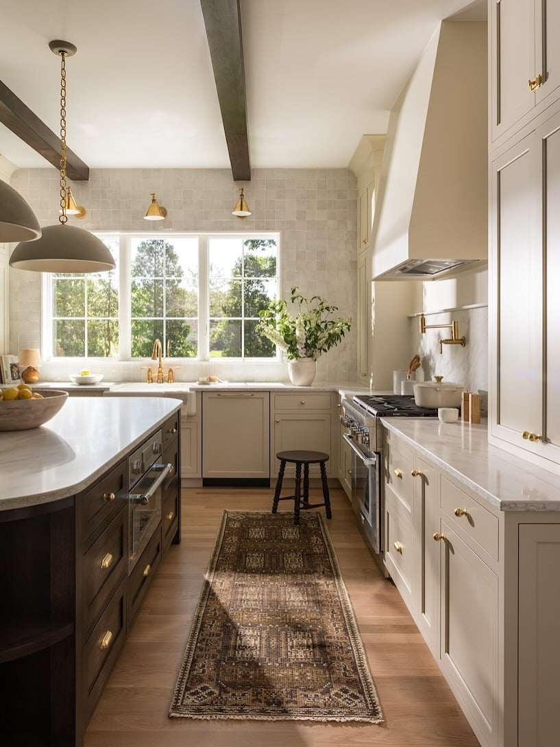 11. Cream White Kitchen with Dark Walnut Island and Brass Accents - natural kitchen ideas