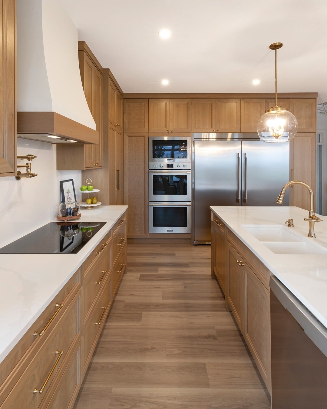 12. Natural Honey Oak Kitchen with White Quartz Countertops - natural kitchen ideas
