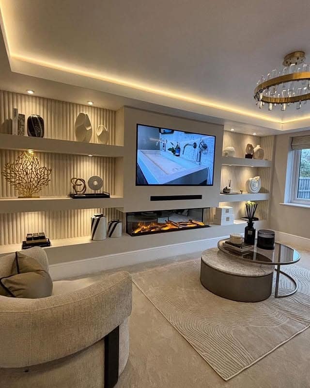 3. Luxury Ivory Entertainment Center with Illuminated Shelving - living room entertainment center ideas